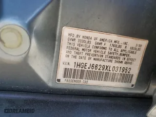 1999 Honda Civic DX with VIN 1HGEJ6629XL031952, listed as a Copart auction lot 41691105 with 66,909 mi miles and Salvage Title. Bid and sale history available at carsss.com. Image 15.