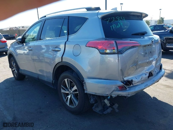 2018 Toyota RAV4 XLE with VIN 2T3WFREV7JW408039, listed as a IAAI auction lot 41686372 with 94,125 mi miles. Bid and sale history available at carsss.com. Image 3.