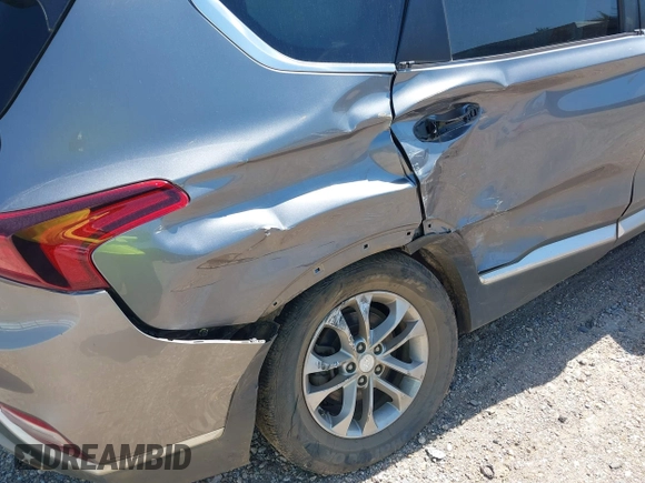 2020 Hyundai Santa Fe SE with VIN 5NMS23AD8LH178541, listed as a IAAI auction lot 41779711 with 86,036 mi miles and . Bid and sale history available at DreamBid. Image 12.