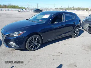 2014 Mazda 3 S Grand Touring with VIN JM1BM1M32E1208762, listed as a IAAI auction lot 41814130 with 117,620 mi miles and . Bid and sale history available at DreamBid. Image 2.