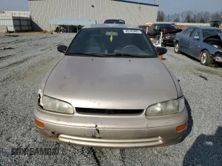 1996 Geo Prizm LSi z VIN 1Y1SK5265TZ029457, wystawiony jako Copart lot #54611415 z przebiegiem 174 816 mil mil oraz Szkoda całkowita • Salvage title. Historia ofert i sprzedaży dostępna na DreamBid. Obrazek 5.