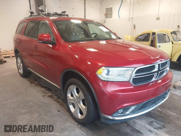 2014 Dodge Durango Limited z VIN 1C4RDJDG2EC370977, wystawiony jako IAAI lot #41872587 z przebiegiem 153 674 mil mil oraz . Historia ofert i sprzedaży dostępna na DreamBid. Obrazek 1.