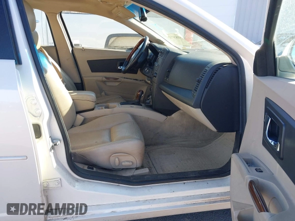 2004 Cadillac CTS with VIN 1G6DM577140186842, listed as a IAAI auction lot 41824732 with 151,858 mi miles. Bid and sale history available at carsss.com. Image 5.