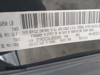 2018 Dodge Grand Caravan SXT with VIN 2C4RDGCGXJR283091, listed as a IAAI auction lot 41966553 with 102,309 mi miles and . Bid and sale history available at DreamBid. Image 9.
