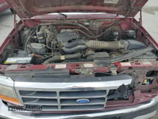 1996 Ford F-150 z VIN 1FTEF15N0TLA02185, wystawiony jako Copart lot #51459355 z przebiegiem 229 421 mil mil oraz Szkoda całkowita • Salvage title. Historia ofert i sprzedaży dostępna na DreamBid. Obrazek 11.