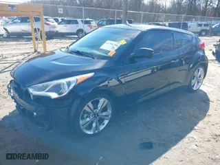 2017 Hyundai Veloster with VIN KMHTC6AD1HU321280, listed as a IAAI auction lot 41294268 with 59,139 mi miles. Bid and sale history available at carsss.com. Image 2.