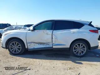2020 Acura RDX Technology with VIN 5J8TC1H59LL011089, listed as a IAAI auction lot 41246036 with 66,261 mi miles and . Bid and sale history available at DreamBid. Image 14.