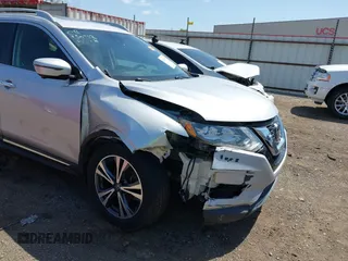 2018 Nissan Rogue SV with VIN 5N1AT2MT6JC844714, listed as a IAAI auction lot 41969677 with 121,187 mi miles and . Bid and sale history available at carsss.com. Image 6.