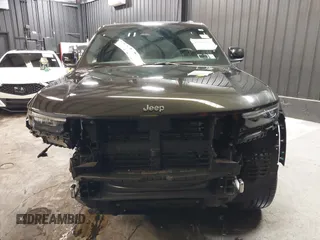 2023 Jeep Grand Cherokee Overland with VIN 1C4RJHDG0P8701157, listed as a IAAI auction lot 42080201 with 24,709 mi miles and . Bid and sale history available at DreamBid. Image 13.