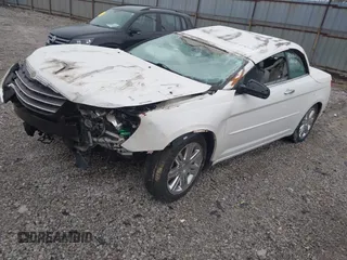 2008 Chrysler Sebring Limited with VIN 1C3LC65M48N289969, listed as a IAAI auction lot 41963154 with Not provided miles and . Bid and sale history available at DreamBid. Image 16.