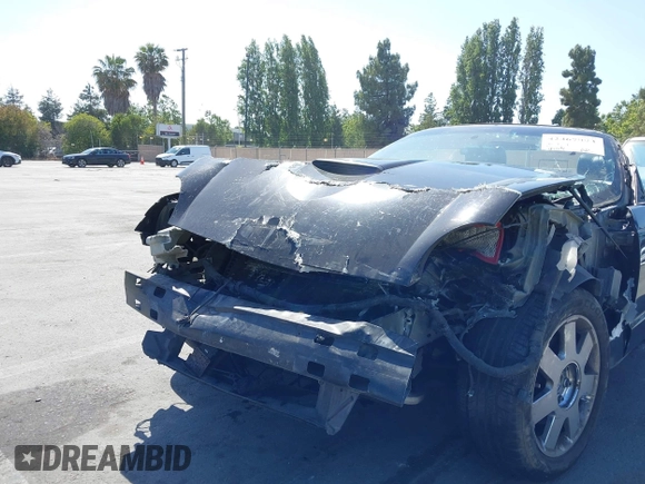 2002 Ford Thunderbird Hardtop Premium z VIN 1FAHP60A82Y103848, wystawiony jako IAAI lot #42467093 z przebiegiem Nie podano mil oraz . Historia ofert i sprzedaży dostępna na DreamBid. Obrazek 6.