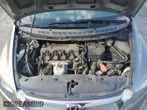 2006 Honda Civic LX z VIN 1HGFA165X6L123586, wystawiony jako Copart lot #54845625 z przebiegiem 105 445 mil mil oraz Szkoda całkowita • Salvage title. Historia ofert i sprzedaży dostępna na DreamBid. Obrazek 11.