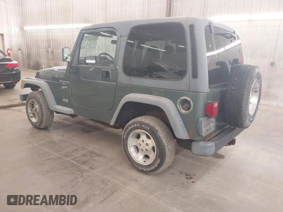 1999 Jeep Wrangler Sport with VIN 1J4FY19S0XP496555, listed as a IAAI auction lot 42110414 with 125,500 mi miles. Bid and sale history available at carsss.com. Image 3.