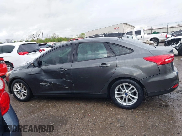 2015 Ford Focus SE with VIN 1FADP3F28FL219552, listed as a IAAI auction lot 41959648 with 128,590 mi miles. Bid and sale history available at carsss.com. Image 14.