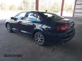2016 Volkswagen Jetta Sedan 1.4T SE with VIN 3VWD67AJ8GM316539, listed as a IAAI auction lot 41870438 with 114,432 mi miles. Bid and sale history available at carsss.com. Image 3.