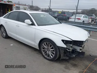 2013 Audi A6 2.0T Premium Plus with VIN WAUGFAFC6DN051237, listed as a IAAI auction lot 41553452 with 114,446 mi miles. Bid and sale history available at carsss.com. Image 1.