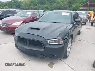 2014 Dodge Charger RT z VIN 2C3CDXCT2EH123810, wystawiony jako IAAI lot #42284705 z przebiegiem 171 159 mil mil oraz . Historia ofert i sprzedaży dostępna na DreamBid. Obrazek 6.