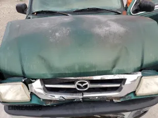 2001 Mazda B-Series 2WD Truck DS with VIN 4F4YR16U11TM00732, listed as a Copart auction lot 86250734 with 234,549 mi miles and Salvage Title. Bid and sale history available at carsss.com. Image 11.