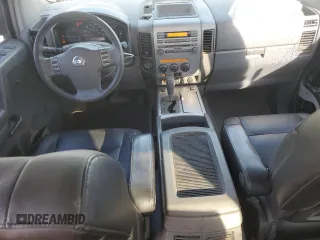 2006 Nissan Titan LE z VIN 1N6AA07B86N516155, wystawiony jako Copart lot #49080025 z przebiegiem 152 345 mil mil oraz Szkoda całkowita • Salvage title. Historia ofert i sprzedaży dostępna na DreamBid. Obrazek 8.