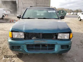 1998 Isuzu Rodeo S z VIN 4S2CK58W0W4339022, wystawiony jako Copart lot #78746864 z przebiegiem 136 138 mil mil oraz Szkoda całkowita • Salvage title. Historia ofert i sprzedaży dostępna na DreamBid. Obrazek 5.