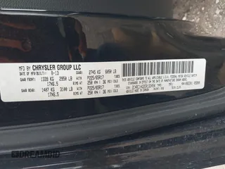 2014 Chrysler Town & Country S with VIN 2C4RC1HG2ER132454, listed as a IAAI auction lot 41743664 with 142,339 mi miles. Bid and sale history available at carsss.com. Image 9.