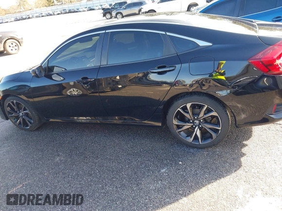 2019 Honda Civic Sport with VIN 2HGFC2F83KH567345, listed as a IAAI auction lot 41353597 with 142,857 mi miles and . Bid and sale history available at DreamBid. Image 14.