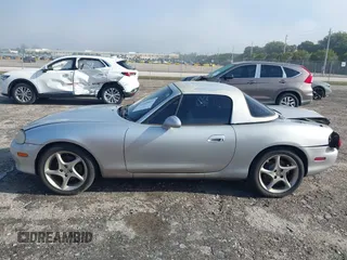 2003 Mazda MX-5 Miata Cloth with VIN JM1NB353730311899, listed as a IAAI auction lot 41929811 with 99,589 mi miles and . Bid and sale history available at DreamBid. Image 14.