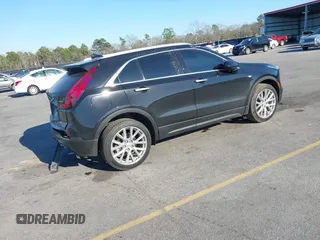 2021 Cadillac XT4 FWD Luxury with VIN 1GYAZAR46MF074767, listed as a IAAI auction lot 41652091 with 46,631 mi miles and . Bid and sale history available at DreamBid. Image 4.