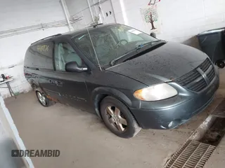 2005 Dodge Caravan SXT with VIN 2D4GP44L25R431882, listed as a IAAI auction lot 42484876 with 242,096 mi miles and . Bid and sale history available at DreamBid. Image 1.