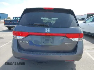 2014 Honda Odyssey Touring with VIN 5FNRL5H91EB093540, listed as a IAAI auction lot 41887412 with 202,076 mi miles and . Bid and sale history available at DreamBid. Image 16.