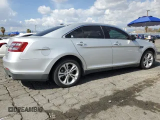 2015 Ford Taurus SEL with VIN 1FAHP2E88FG121647, listed as a Copart auction lot 51660585 with 155,686 mi miles and Clean Title. Bid and sale history available at DreamBid. Image 3.