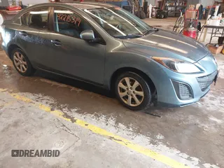 2011 Mazda 3 i Touring with VIN JM1BL1VGXB1360160, listed as a IAAI auction lot 42215319 with 161,993 mi miles and . Bid and sale history available at DreamBid. Image 1.
