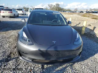 2023 Tesla Model 3 with VIN 5YJ3E1EAXPF704742, listed as a Copart auction lot 86323624 with 4,401 mi miles and Salvage Title. Bid and sale history available at carsss.com. Image 5.