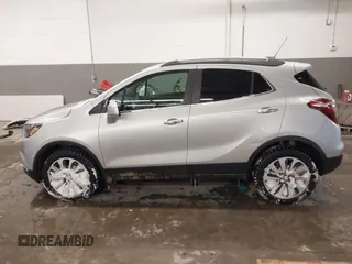 2021 Buick Encore Preferred with VIN KL4CJESB5MB308467, listed as a IAAI auction lot 41569987 with 52,199 mi miles. Bid and sale history available at carsss.com. Image 14.