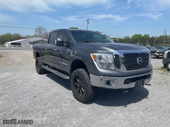 2016 Nissan Titan XD Platinum Reserve with VIN 1N6BA1F2XGN516798, listed as a Copart auction lot 53584635 with 104,737 mi miles and Clean Title. Bid and sale history available at carsss.com. Image 1.