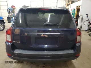 2014 Jeep Compass Sport with VIN 1C4NJDBB0ED598518, listed as a Copart auction lot 55072665 with 128,141 mi miles and Salvage Title. Bid and sale history available at carsss.com. Image 6.