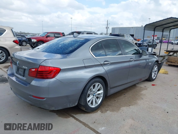 2014 BMW 5 Series 528i with VIN WBA5A5C52ED500696, listed as a IAAI auction lot 41708462 with 121,592 mi miles. Bid and sale history available at carsss.com. Image 4.