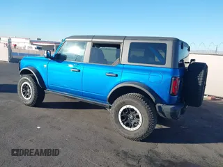 2022 Ford Bronco z VIN 1FMEE5DPXNLB37346, wystawiony jako IAAI lot #41346731 z przebiegiem 20 709 mil mil oraz . Historia ofert i sprzedaży dostępna na DreamBid. Obrazek 3.