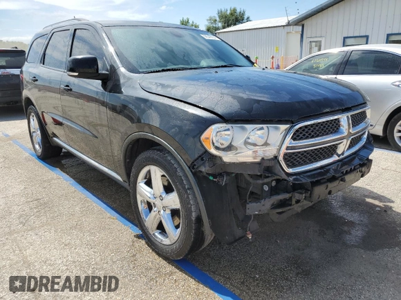 2012 Dodge Durango Crew with VIN 1C4SDHDT2CC229721, listed as a Copart auction lot 68546654 with 118,111 mi miles and Salvage title. Bid and sale history available at DreamBid. Image 4.