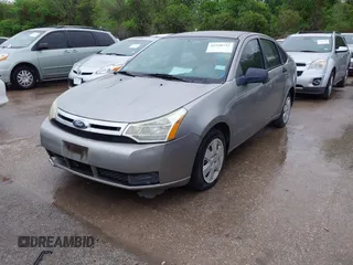 2008 Ford Focus S with VIN 1FAHP34N98W279940, listed as a IAAI auction lot 41950732 with 145,562 mi miles. Bid and sale history available at carsss.com. Image 2.