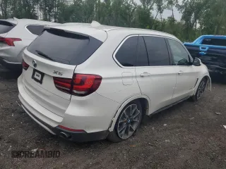 2017 BMW X5 xDrive35i with VIN 5UXKR0C56H0V68771, listed as a Copart auction lot 59587015 with 164,990 mi miles and Salvage title. Bid and sale history available at DreamBid. Image 3.