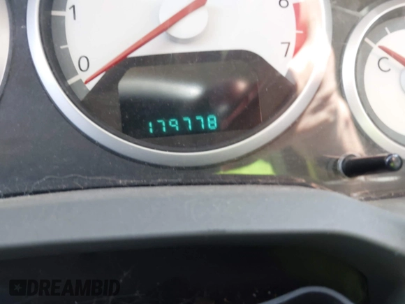 2010 Dodge Grand Caravan SXT with VIN 2D4RN5DX8AR124993, listed as a IAAI auction lot 42250336 with 179,778 mi miles and . Bid and sale history available at DreamBid. Image 7.