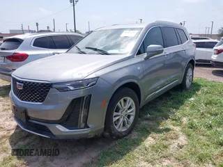 2024 Cadillac XT6 FWD Luxury z VIN 1GYKPAR48RZ747722, wystawiony jako IAAI lot #41923351 z przebiegiem Nie podano mil oraz . Historia ofert i sprzedaży dostępna na DreamBid. Obrazek 2.