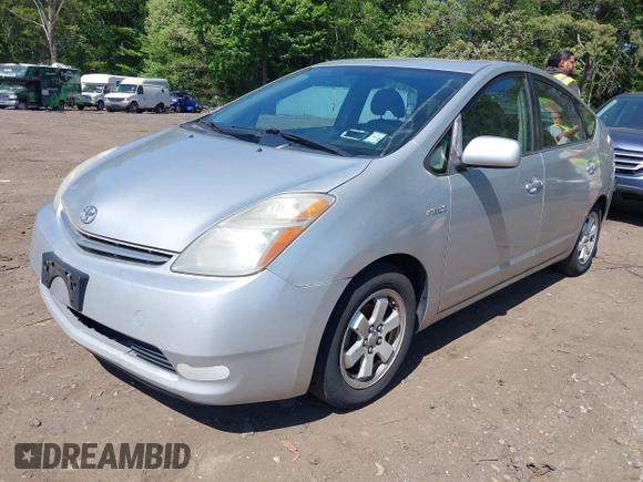 2006 Toyota Prius z VIN JTDKB20U667543175, wystawiony jako IAAI lot #42313159 z przebiegiem 277 637 mil mil oraz . Historia ofert i sprzedaży dostępna na DreamBid. Obrazek 2.