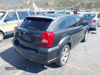 2011 Dodge Caliber Mainstreet with VIN 1B3CB3HA9BD120950, listed as a IAAI auction lot 42150354 with 103,015 mi miles. Bid and sale history available at carsss.com. Image 4.
