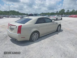 2010 Cadillac CTS Luxury z VIN 1G6DE5EG7A0149418, wystawiony jako IAAI lot #42311562 z przebiegiem 158 517 mil mil oraz . Historia ofert i sprzedaży dostępna na DreamBid. Obrazek 4.