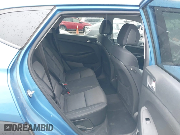 2017 Hyundai Tucson Sport z VIN KM8J33A23HU319048, wystawiony jako IAAI lot #42340603 z przebiegiem 51 738 mil mil oraz . Historia ofert i sprzedaży dostępna na DreamBid. Obrazek 8.