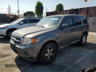2011 Ford Escape XLS with VIN 1FMCU0C79BKC12943, listed as a Copart auction lot 64702085 with 151,117 mi miles and Clean title. Bid and sale history available at DreamBid. Image 1.