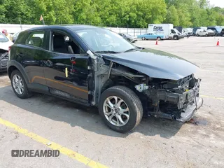 2016 Mazda CX-3 Touring z VIN JM1DKBC75G0114621, wystawiony jako IAAI lot #42389111 z przebiegiem 161 503 mil mil oraz . Historia ofert i sprzedaży dostępna na DreamBid. Obrazek 1.