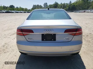 2016 Audi A8 Sport z VIN WAU43AFD7GN005425, wystawiony jako Copart lot #58781405 z przebiegiem 139 435 mil mil oraz Szkoda całkowita • Salvage title. Historia ofert i sprzedaży dostępna na DreamBid. Obrazek 6.